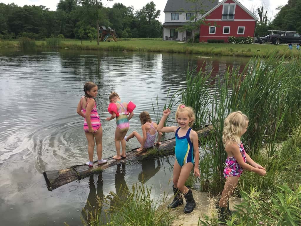 The girls swam in water other than a swimming pool for the first time today at Stella and Ruby’s house, and they loved it! Gwen was unsure of the muddy bottom, but she did finally jump in with everyone else. Josie freaked out when the dogs or goats got too close, but didn’t blink an eye at swimming with frogs and turtles. Abby is part farm girl. She loved everything!