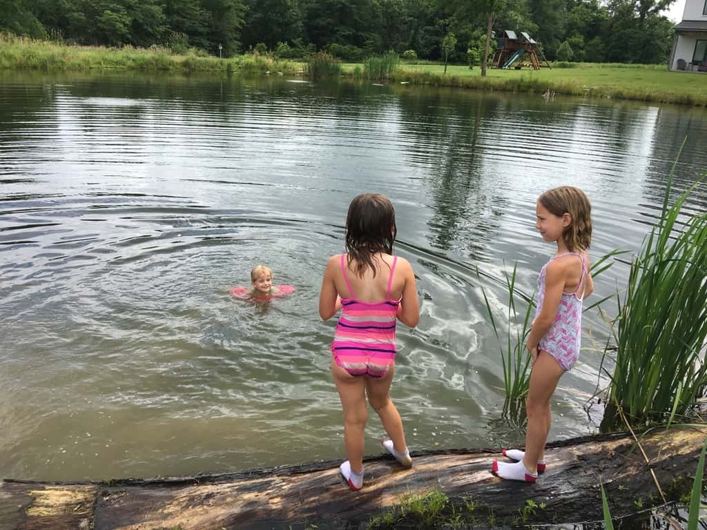 The girls swam in water other than a swimming pool for the first time today at Stella and Ruby’s house, and they loved it! Gwen was unsure of the muddy bottom, but she did finally jump in with everyone else. Josie freaked out when the dogs or goats got too close, but didn’t blink an eye at swimming with frogs and turtles. Abby is part farm girl. She loved everything!