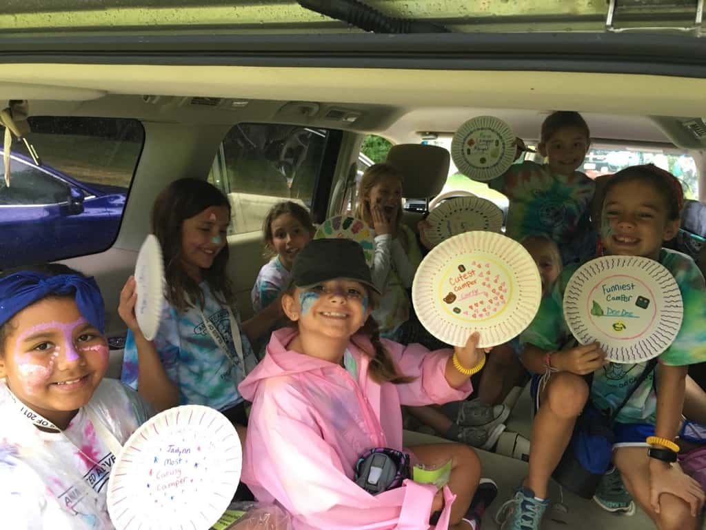 The last day at camp was a wet one! We spent some time in vans and were dismissed early, but they still had fun crafting, getting their faces painted, eating snow cones, making masks, and playing pictionary.